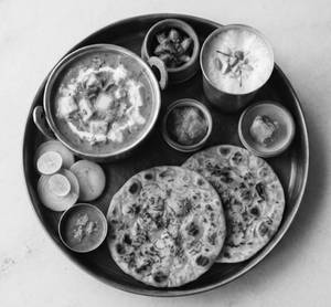 Aloo Paratha With Paneer Butter Masala