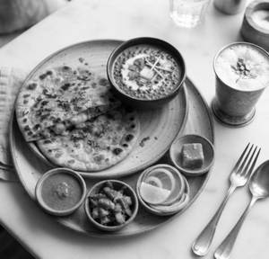 Aloo Cheese Paratha With Dal Makhani