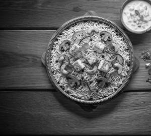 Paneer Biryani + Gravy+ Salad+ Raita