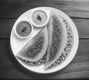 2 Schezwan Egg Dosa's