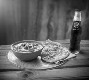 Paneer Butter Masala + Parotta (2 Pcs) + Pepsi (250 ml)