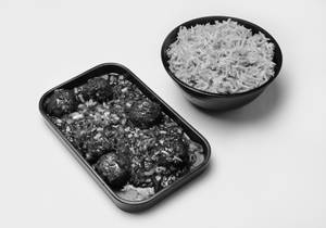 Veg Burnt Garlic Fried Rice With Veg Manchurian (650 Ml)