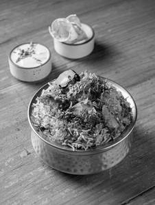 Paneer Tikka Biryani With Papad & Raita