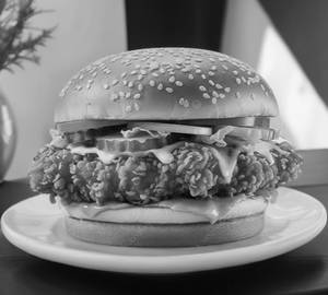 Cheesy chicken popcorn burger