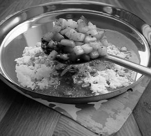 Rice with rasam and potato fry and curd