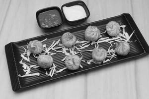 Veg fried momos [7 pieces]