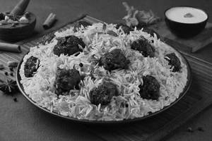 Lucknowi Pepper Chicken Biryani (Serves 1).
