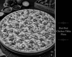 Peri Peri Chicken Tikka Pizza( We Serve Halal Only )