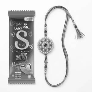 Dairy Milk Roast Almond 75gm + Rakhi Combo