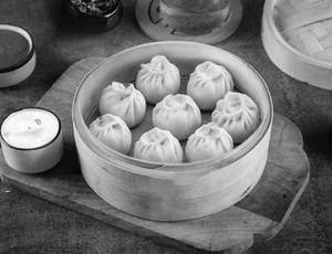 3 Pcs Veg Steam Momos..