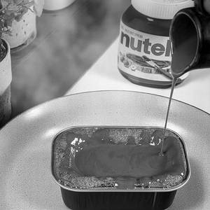 Nutella & Chocolate Stuffed Cookie Boat Served With Extra Nutella