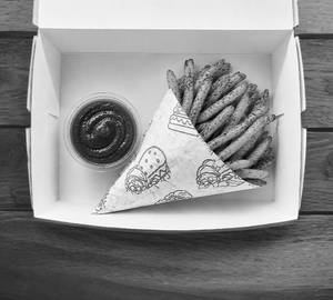 A Box Of Fries With Smoked Bbq Dip