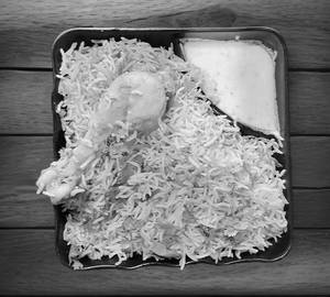 Lucknowi Chicken Biryani [Half]