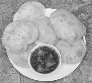 Luchi With Kashmiri Aloo Dum
