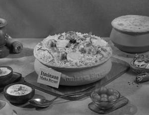 1 KG Shahi Egg Matka Biryani + FREE Dessert