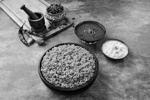 Dindigul Plain Biryani (seeraga Samba Plain Biryani - Served With Chicken Gravy & Raita - 400g)