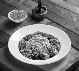 Wok Fried Noodles Served With Bean Curd And Vegetables