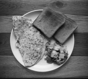 Masala omelette with salad and toasted breads