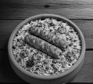 Clay Pot Biryani With Chicken Seekh Kebab
