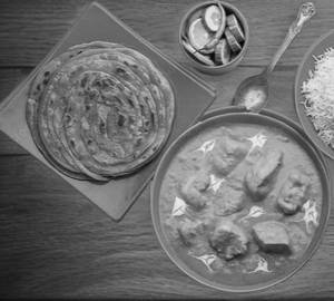 Laccha paratha [2] with schezwan chicken [3 pieces]