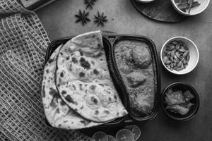Aloo Dum + Tandoori Roti ( 2 Pcs)