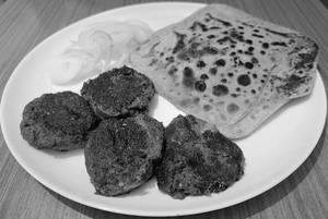 Shami Kebeb(2Pc) + Galwat Kebab (2Pc)+ Paratha (4Pc)