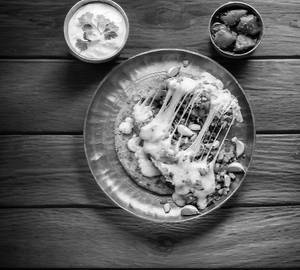 1. Cheese Garlic Paratha single with 100 g dahi (Extra Cheese)