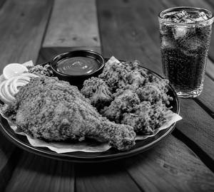 2 Chicken Legs, + 6 Chicken Pakoras + 1 Soft Drink
