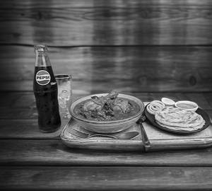 Paneer Butter Masala + Parotta 2 Pcs + Pepsi (250 Ml)
