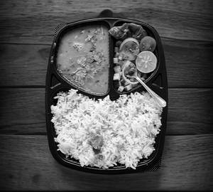 Dal chawal with salad and achar