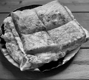 Bread Omelette With Butter         [ 2 Eggs . 4 slice bread.]￼