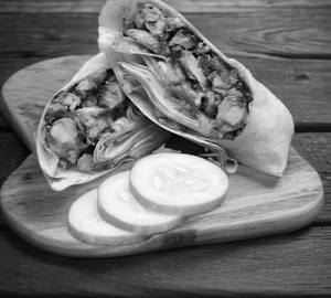 Schezwan chicken shawarma roll