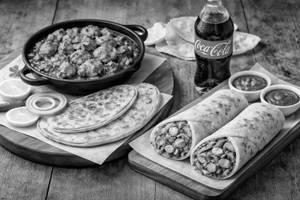Paneer Kosha Laccha Paratha+paneer Roll+coke250ml