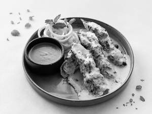 Malai Seekh Naan Roll  ( 04 Pieces )