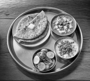2 Aloo roti pure desi ghee + shahi paneer+ boondi Raita+ salad