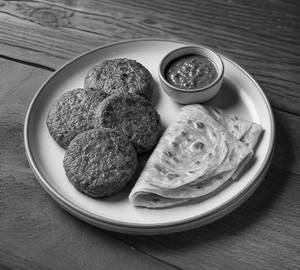 Mutton Galouti Kebab Served With Paratha                                         