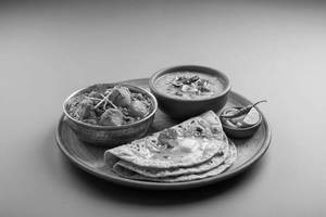 Aloo Dum with 4 Butter Roti and Tadka