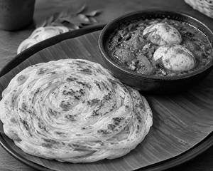 Kerala Paratha With Egg Curry