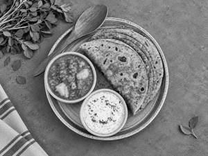 Methi Thepla With Bedmi Aloo & Raita.