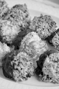 COCONUT CHOC DIPPED MACAROON