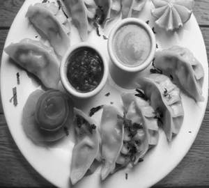 Chicken steamed momos [6 pieces]