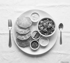 Puri Sabji Combo (4 puri..sabji...1 sweet...salad..achar..papad)