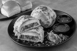 Masala aloo stuffed n egg wrapped pao 2pc.