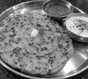 Multigrain Aalu Paratha With Green Chutney & Curd
