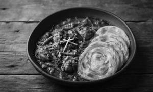 Paratha With Kadai Chicken