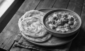 Paratha With Butter Chicken