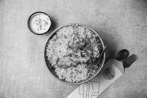 Chicken Dum Biryani Served With Raita