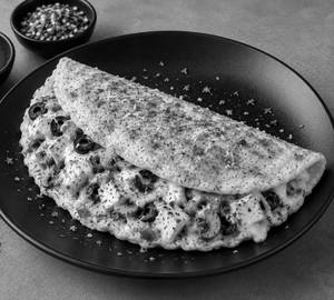 Paneer mushroom olive n cheese stuffed omelet.