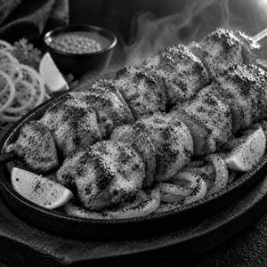 Chicken Achaari (8pc)