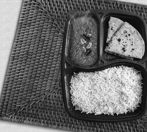 Masoor Dal Gravy With 2 Roti And Rice In Tray